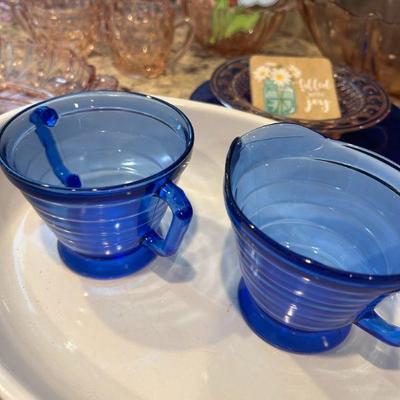 Blue pyrex like measuring cups. 