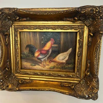 Original in solid wood gilt frame. 