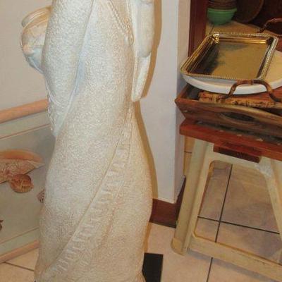 Hall lady carrying jar sculpture