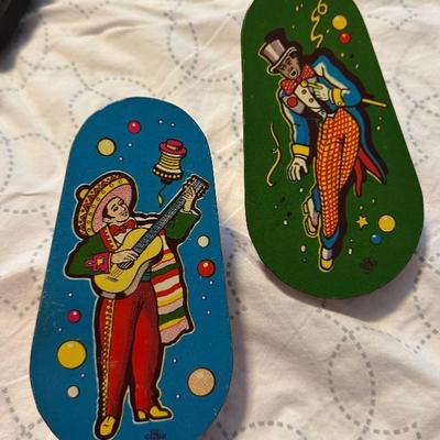 Vintage tin noisemaker toys