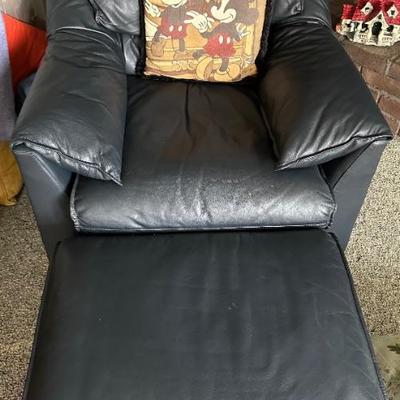 overstuffed black leather chair