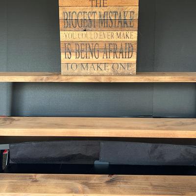 Floating Wooden Shelves And Motivational Sign