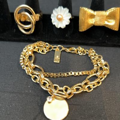3 Gold-Tone Rings And Bracelet