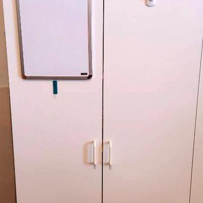 White Storage Cabinet Filled With Sewing And Crafting Supplies # 1