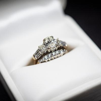 Lot 048-J: Woman’s Gold/Diamond Wedding Band Set 