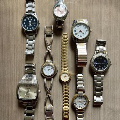 Assortment Of Men’s And Women’s Watches On Links