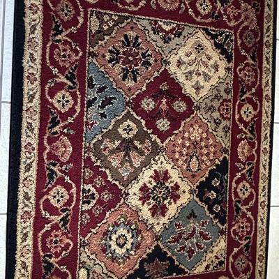 Black/red/tan Rug