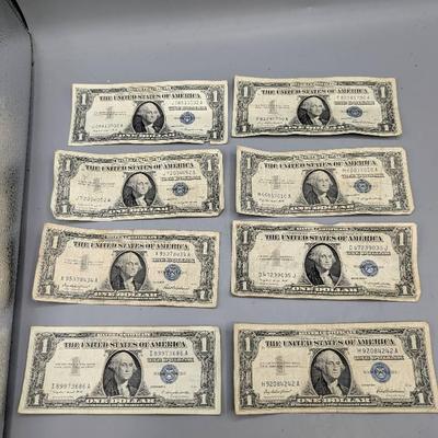 Eight 1957 & 1935 $1 Silver Certificates