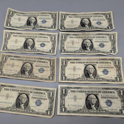 Eight 1957 $1 Silver Certificates