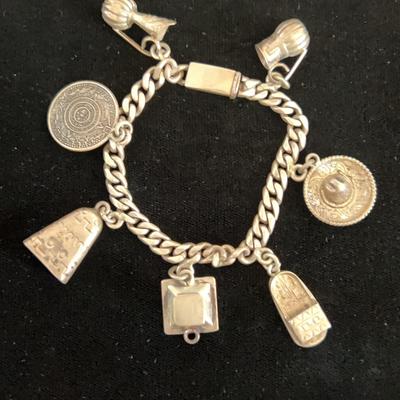 Small Sterling Silver Charm Bracelet