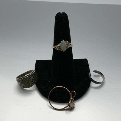Four 14 Karat Rings
