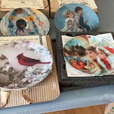 Four Collectible Plates