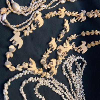 Lot Of Shells And Wood Animal Necklaces 