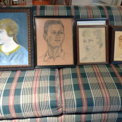 A Collection Of Framed Portraits 