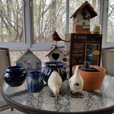 Intricate Birdhouses, Ceramic Pots, And More