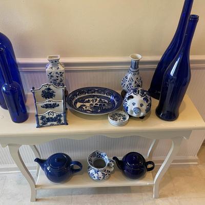 White Shelf with Blue Pottery