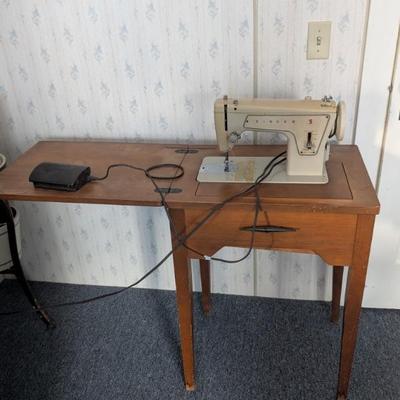 Vintage sewing machine and table-works