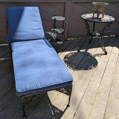 Cast Iron Lounge Chair, Side Table, And Three Tiered Plant Stand
