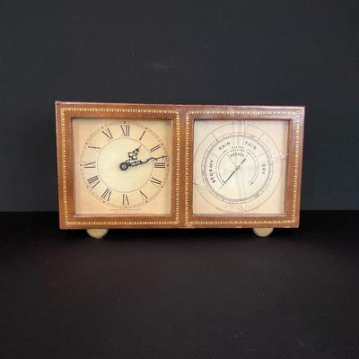Howard Miller Clock With Barometer