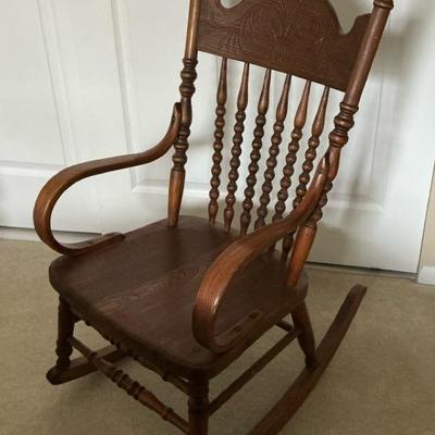 Carved Wood Child's Rocking Chair