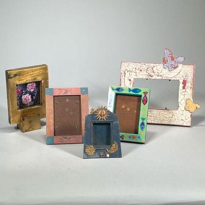 (5pc) Wooden Decorative Frames | One gold painted with stand. Dimensions: h. 10 x w. 11.5 in (largest)

