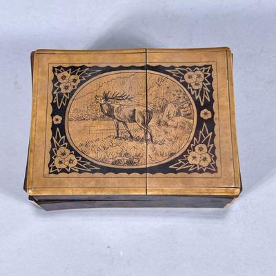 LUCITE & WOOD BOX | Carved wood box with lucite shell . Dimensions: h. 1.5 x w. 3 x l. 4.25 in

