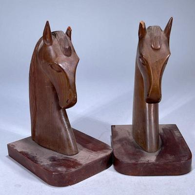 (2pc) PAIR HORSE BOOKENDS | Carved wood horse head bookends. Dimensions: h. 9.5 x w. 5 x l. 6 in