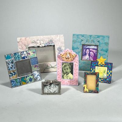 (7pc) Glass, Metal, Assorted Frames | Picture frames Dimensions: h. 7.5 x l. 9.5 in (largest)

