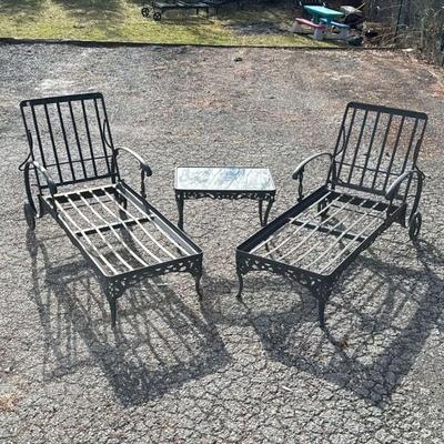 CAST IRON LAWN CHAIR SET | Two lawn chairs and a glass top side table. - h. 39 x w. 77 x l. 26-1/2 in

