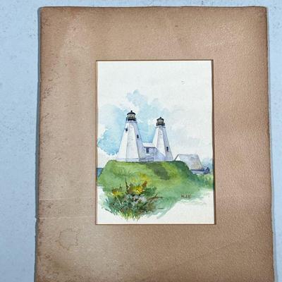LIGHTHOUSE WATERCOLOR | lighthouse Watercolor on paper 7 x 5 in. Sight Initialed “M.J.F.” Lower left, unframed Dimensions: h. 12 x w. 10...