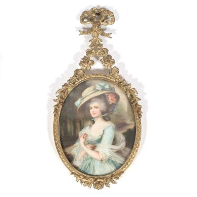 MINIATURE PORTRAIT | Woman in blue with flowers In a brass decorative frame 3.25 x 2.5 in., sight Dimensions: h. 6 x w. 2.75 in (overall)

