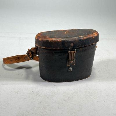 FELDSTECHER & FACH BINOCULARS | Feldstecher & Fach leather bound binoculars in leather case Dimensions: h. 5 x w. 3.5 x l. 7 in...