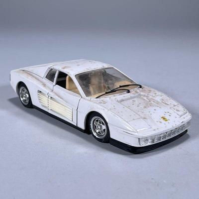 FERRARI TESTAROSSA 1/24 SCALE MODEL | 1/24 scale model of the 1984 Ferrari Testarossa Made in Italy. Dimensions: h. 1.75 x w. 3 x l. 7.25...