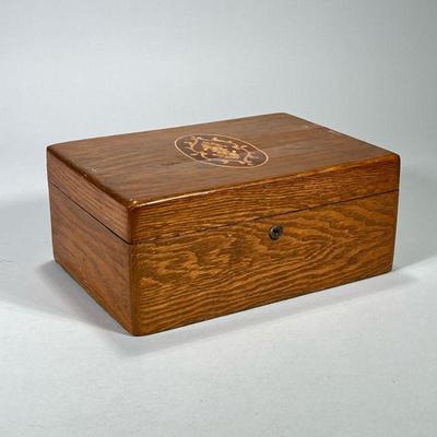 INLAID CARVED WOOD BOX | Carved wood box with inlay wood top and metal interior Dimensions: h. 5 x w. 11.5 x d. 8 in

