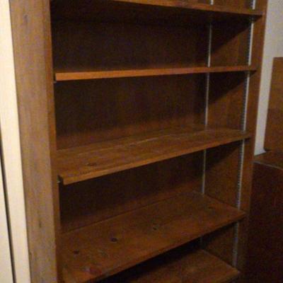 Three Distinct Shelving Units 