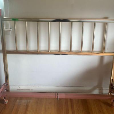 Brass colored full size head board / year old mattress available