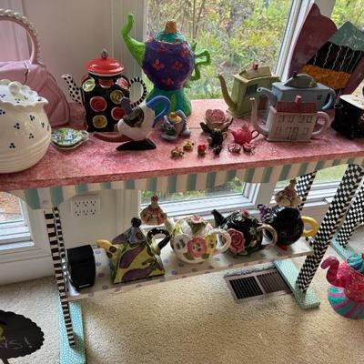 Just a few from a huge teapot collection on handpainted table