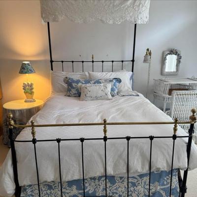Antique rod iron and brass canopy bed