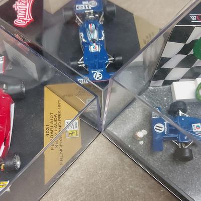 QUARTZO AND WORLD CHAMPIONS DIE CAST CARS FEATURING FERRARI AND TYRRELL 