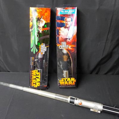 PAIR OF ELECTRONIC STAR WARS LIGHTSABERS BY HASBRO