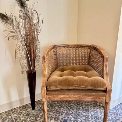 Cane Barrel Chair & Cushion + Tall Vase w/ Peacock Feather Arrangement	