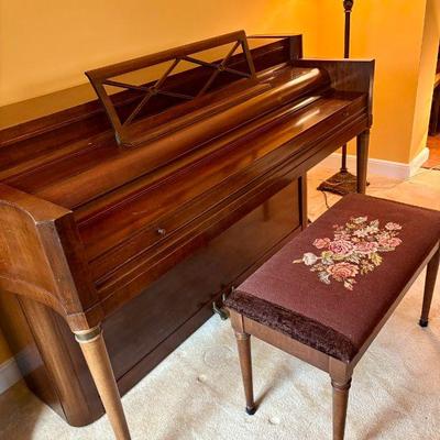 Upright piano and bench