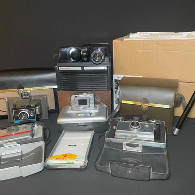 Vintage Cameras - Canon, Kodak & Polaroid! Even a Slide Projector - A Nostalgic Treasure Trove!