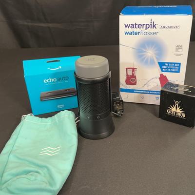 Waterpik New In Box, echo auto , Radio Pedometer & Wynd Essential Air Purifier