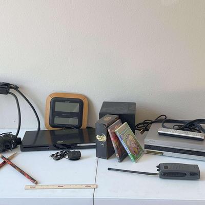 Electronics: Tablet Stand, Blueray 3d Player, Altec Pro Subwoofer, Pioneer Receiver, Star Wars DVDs+