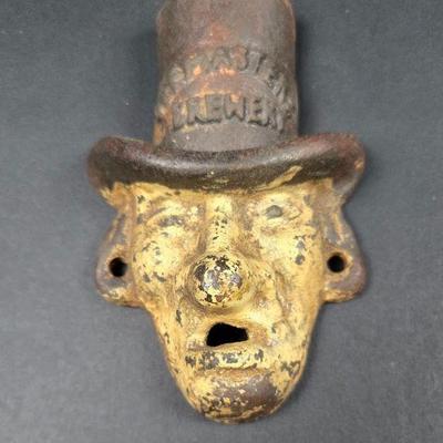 Antique bottle opener