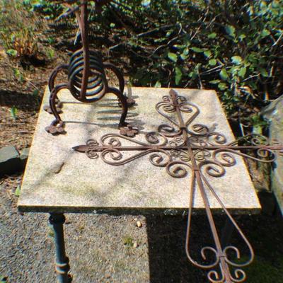 Rustic Wrought Iron Garden Décor with Stone-Top Accent Table