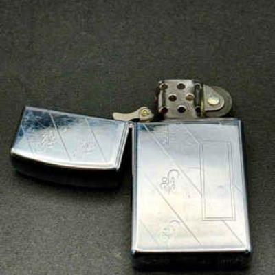 Vintage Chrome Patterned Zippo Lighter
