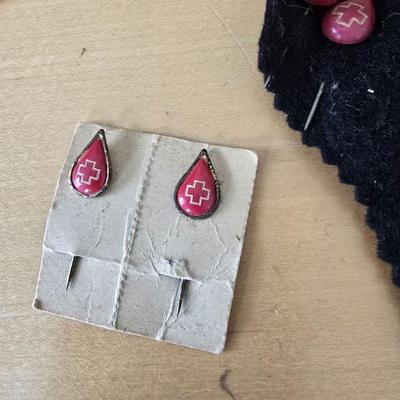 Red cross pins