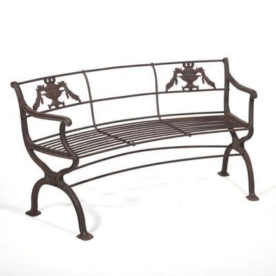 "REGENCY CAST IRON GARDEN BENCH | Cast iron outdoor bench with a curved seat and x-form supports, urn splats
h. 28 x l. 54 x d. 20...